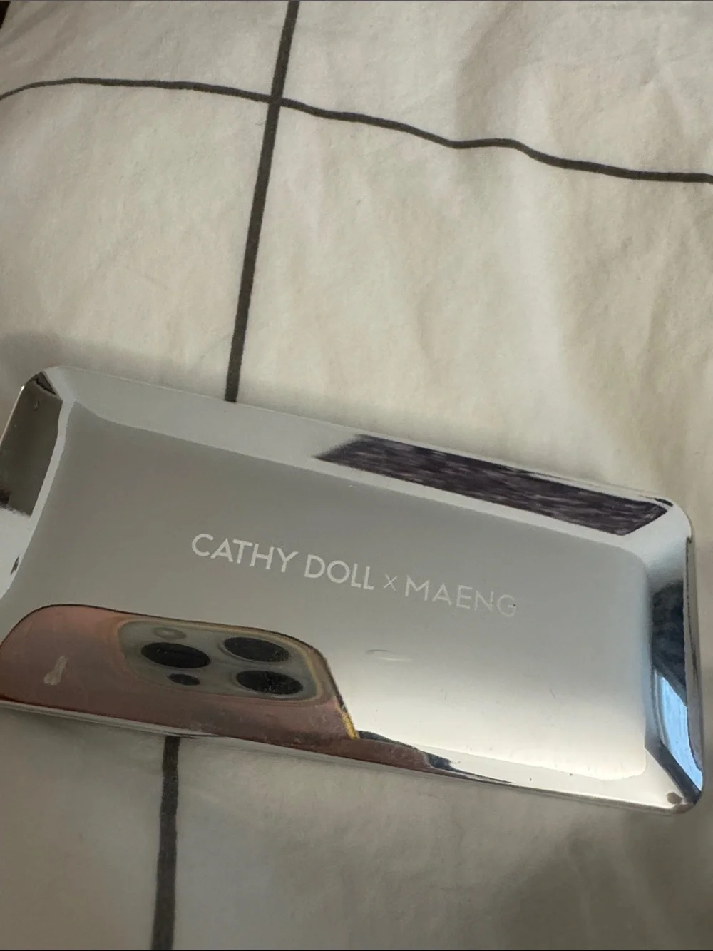 Cathy Doll x Maeng Reflective Silver Phone Case